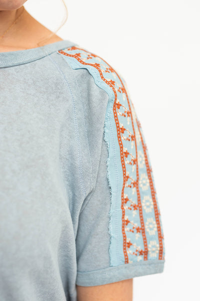 Chambray top with embroidery on sleeves