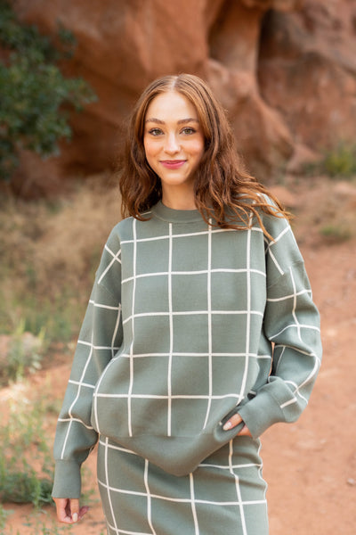Olive plaid sweater with long sleeves