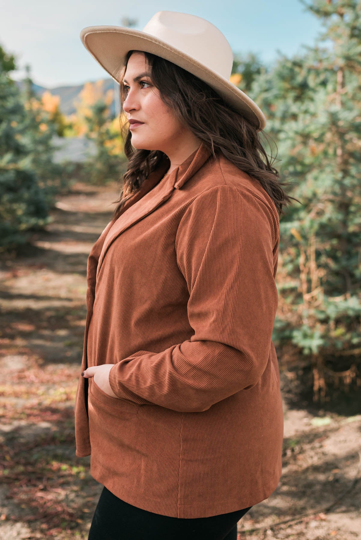 Side view of the plus size chestnut blazer