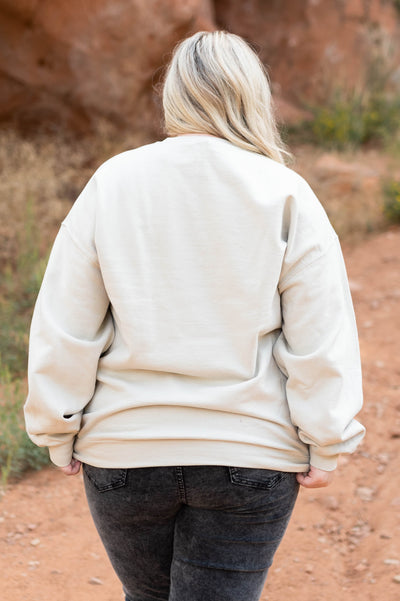 Back view of a boot scoot-in sand sweatshirt