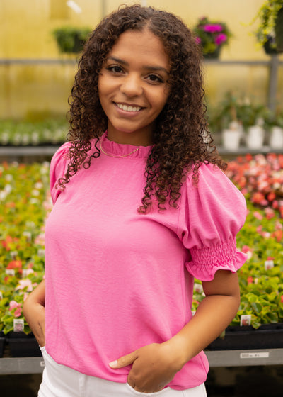 Small bubble gum top with ruffle on at the neck