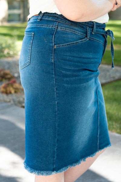 Side view of a plus size indigo skirt