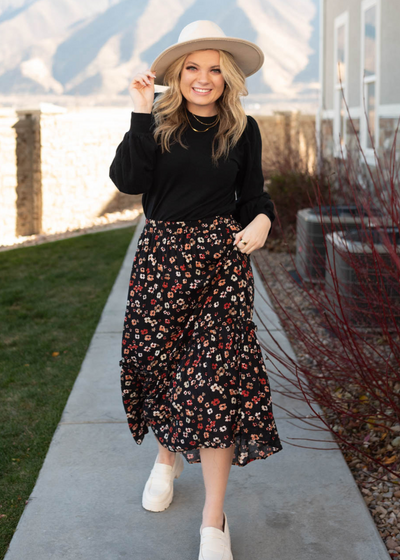 Black floral skirt with red flowers
