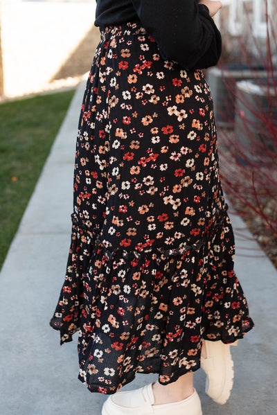 Side view of a black floral skirt