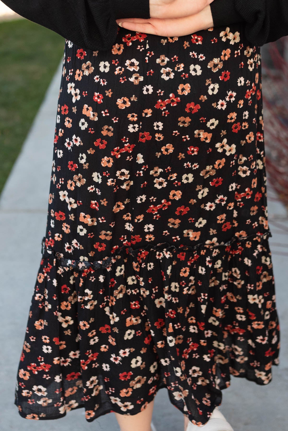 Back view of a black floral skirt