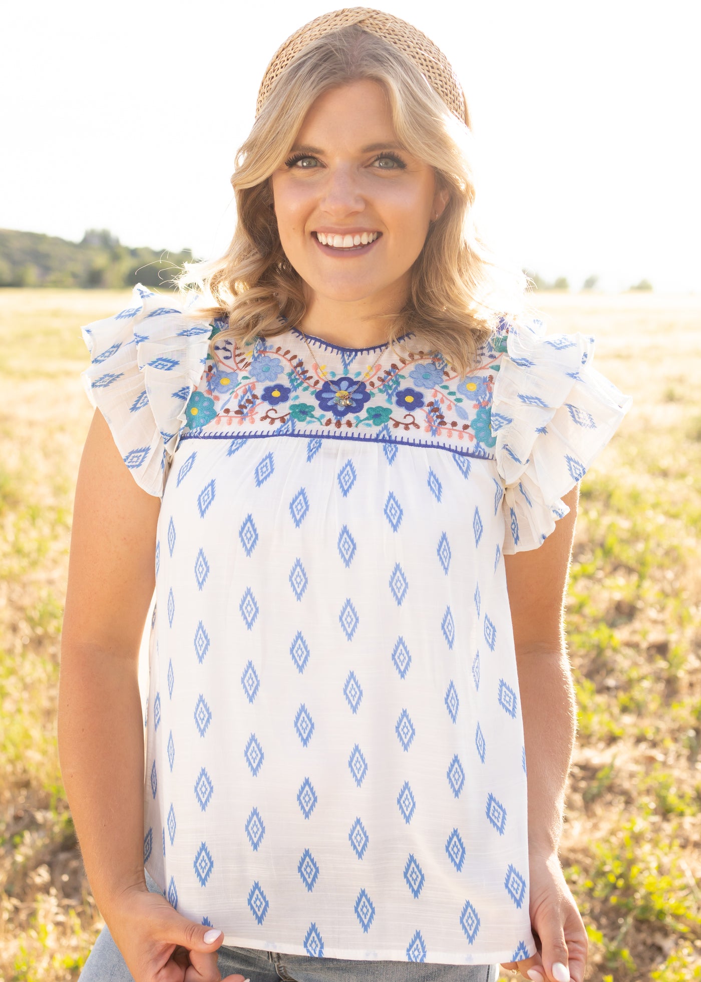 Blue top with short ruffle sleeves