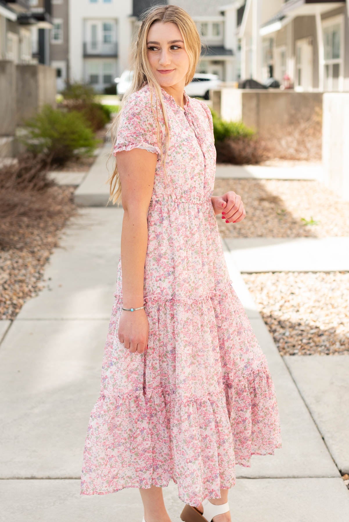 Side view of the pink floral tiered dress