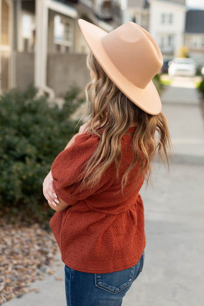 Side view of a auburn tiered shirt