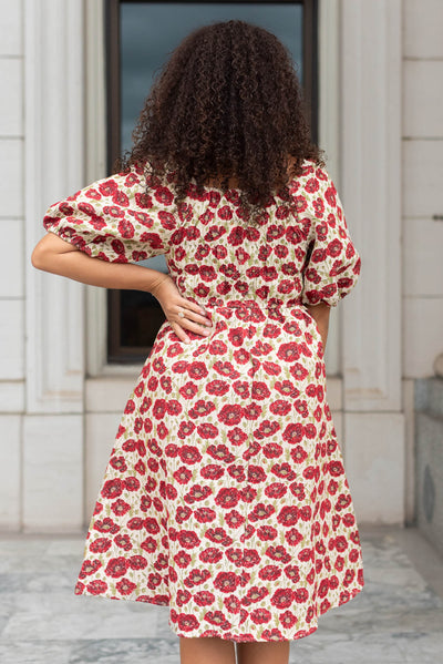 Back view of a red floral dress