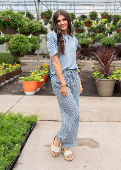 Blue gingham pants with tie at the waist