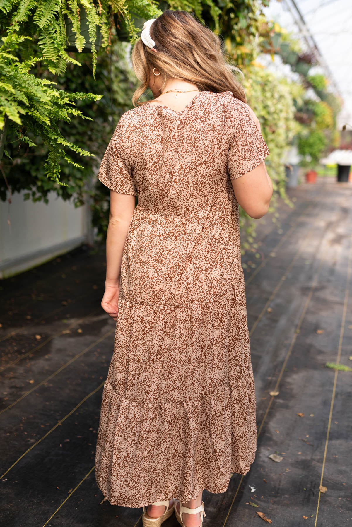 Back view of the brown floral dress
