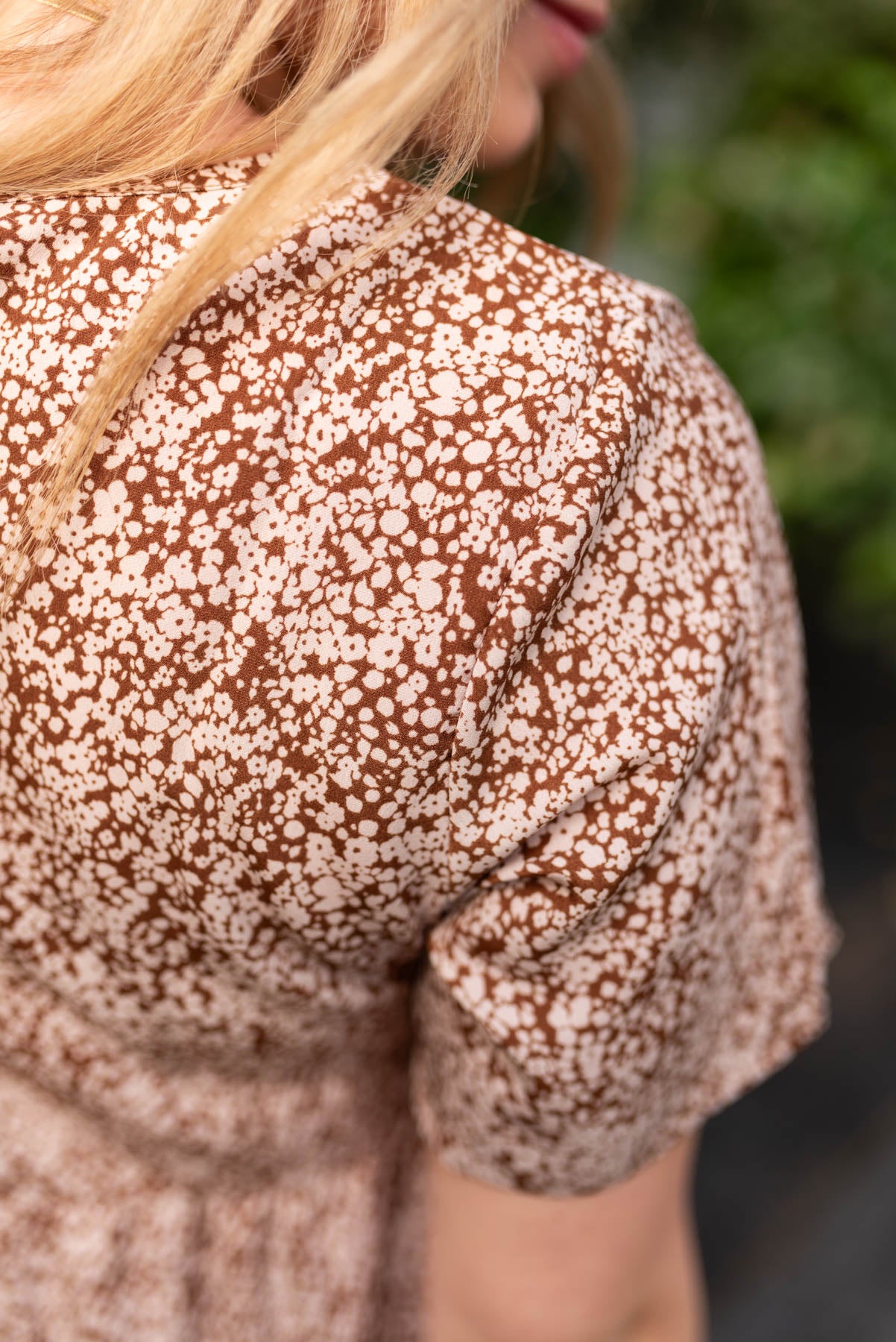 Close up of the fabric on the brown floral dress