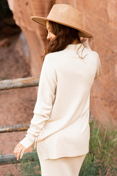 Back view of a oatmeal sweater