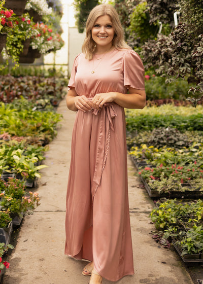 Short sleeve satin blush dress that ties at the waist