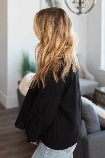 Side view of a black blouse