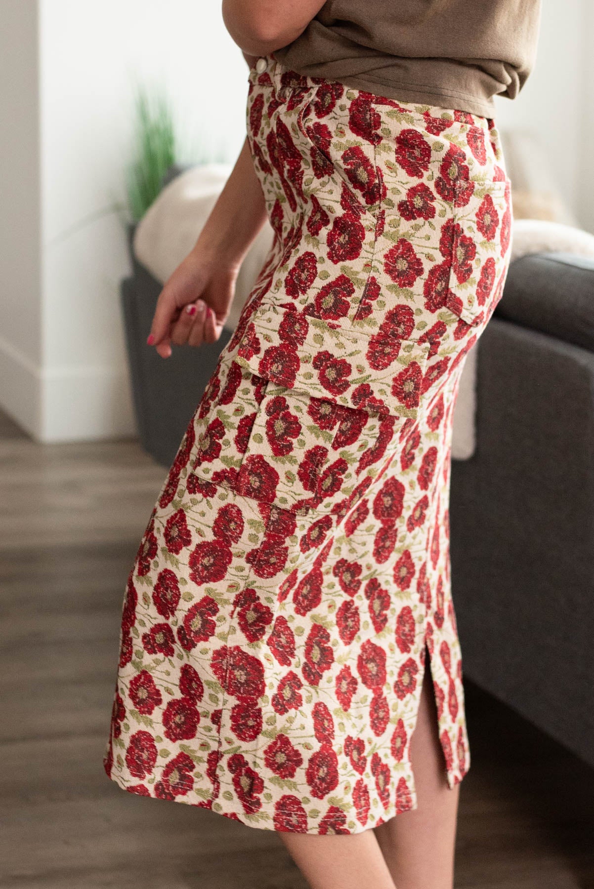 Side view of the red floral cargo skirt