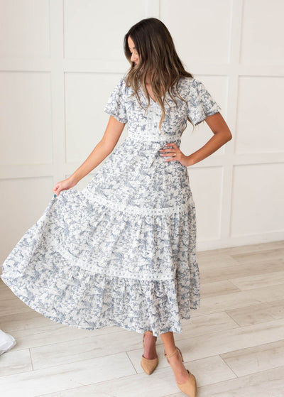 White and blue floral tiered dress with white lace trim