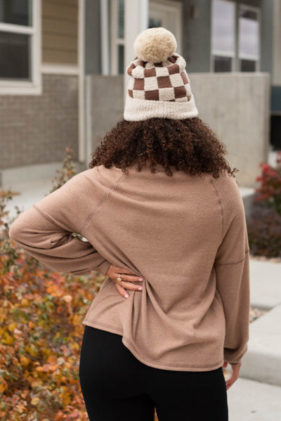 Back view of the mocha button top