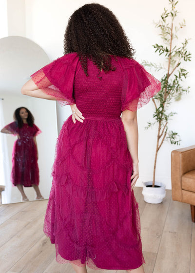 Back view of the burgundy smocked ruffle dress