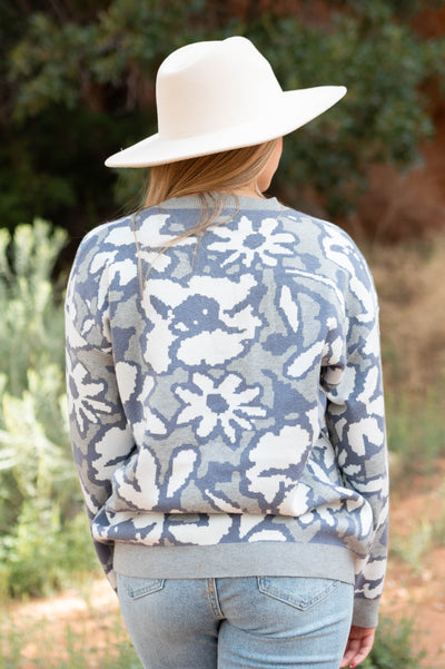 Back view of a grey sweater