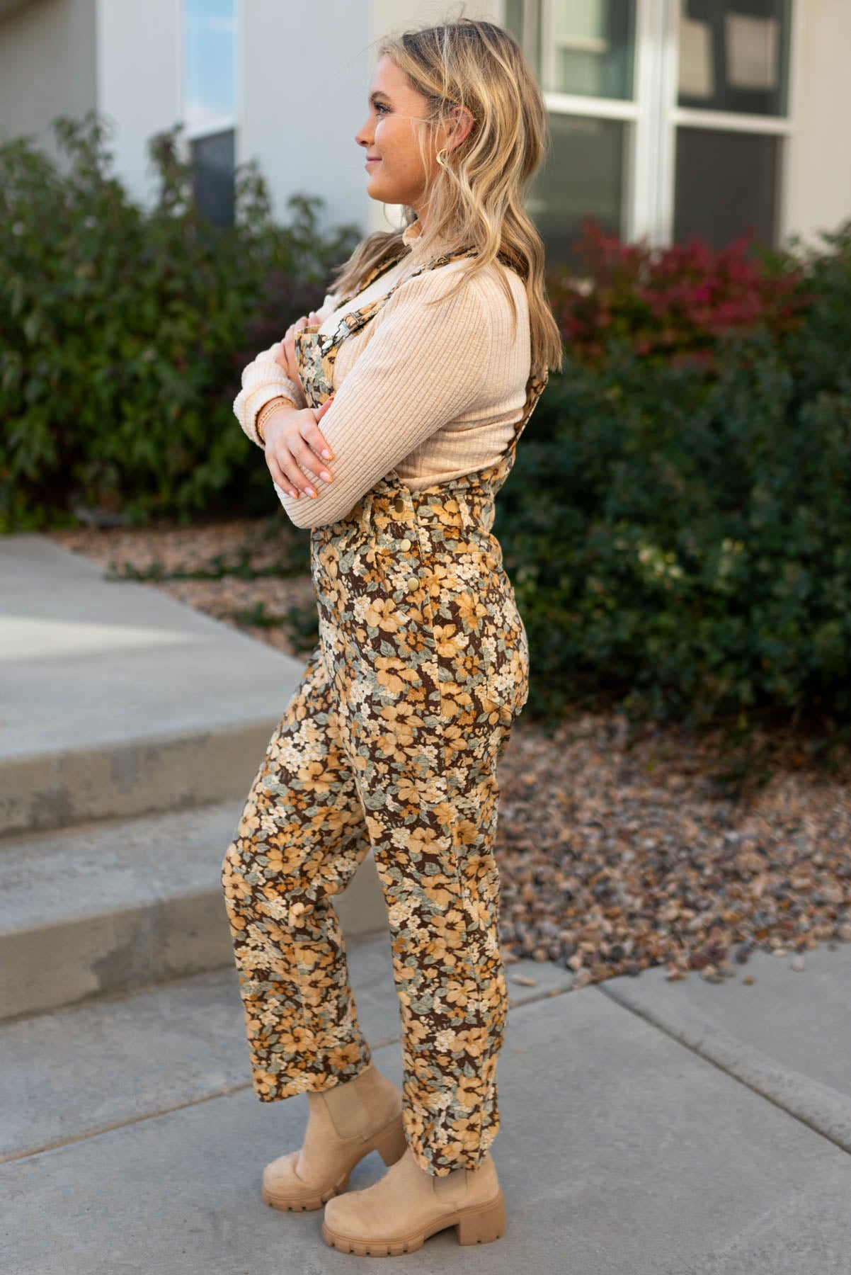 Side view of floral corduroy overalls