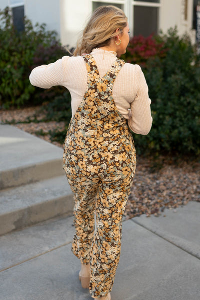 Back view of the floral corduroy overalls