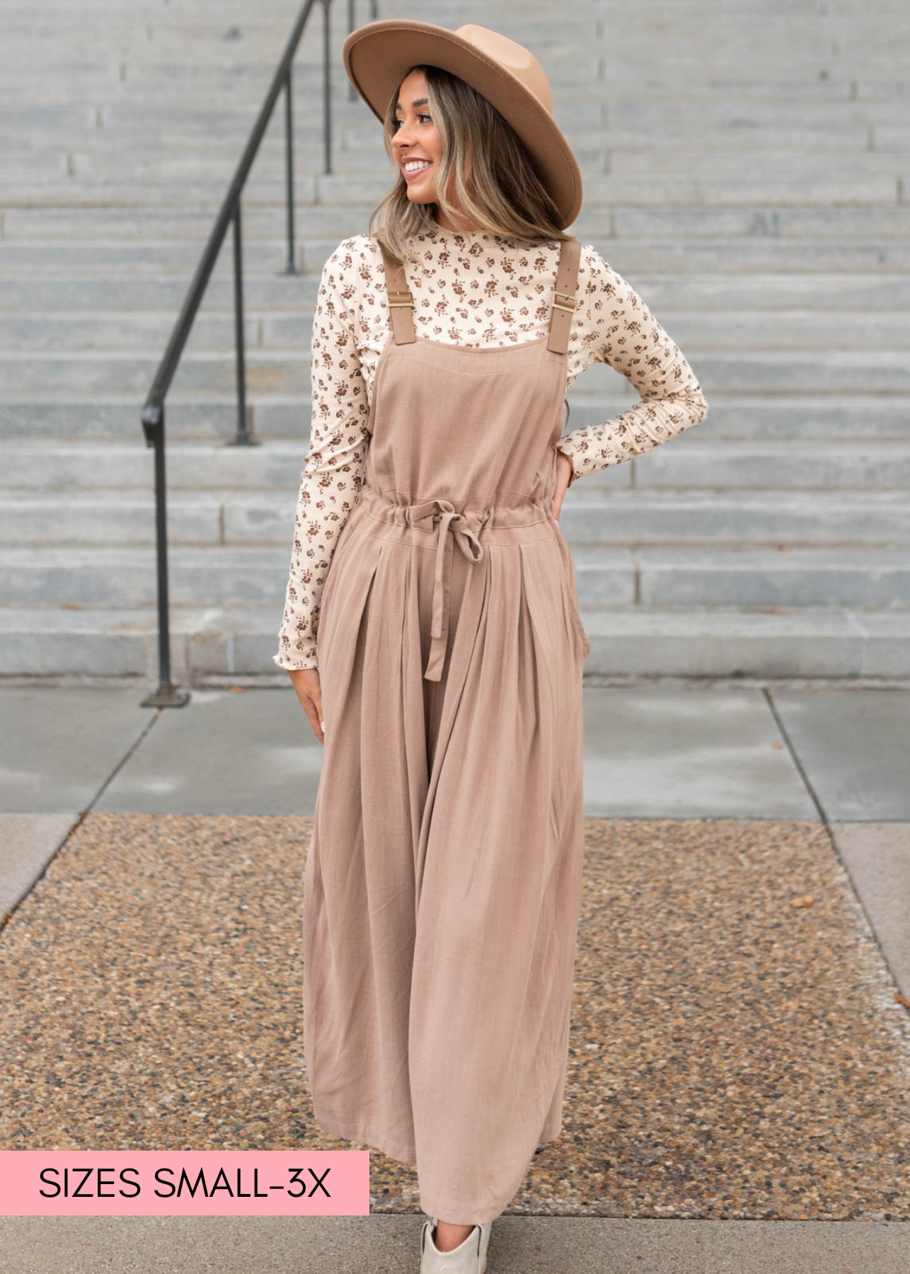 Small mocha jumpsuit that ties at the waist and has pockets