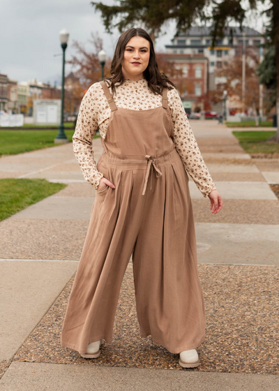 Plus size mocha jumpsuit that ties at the waist