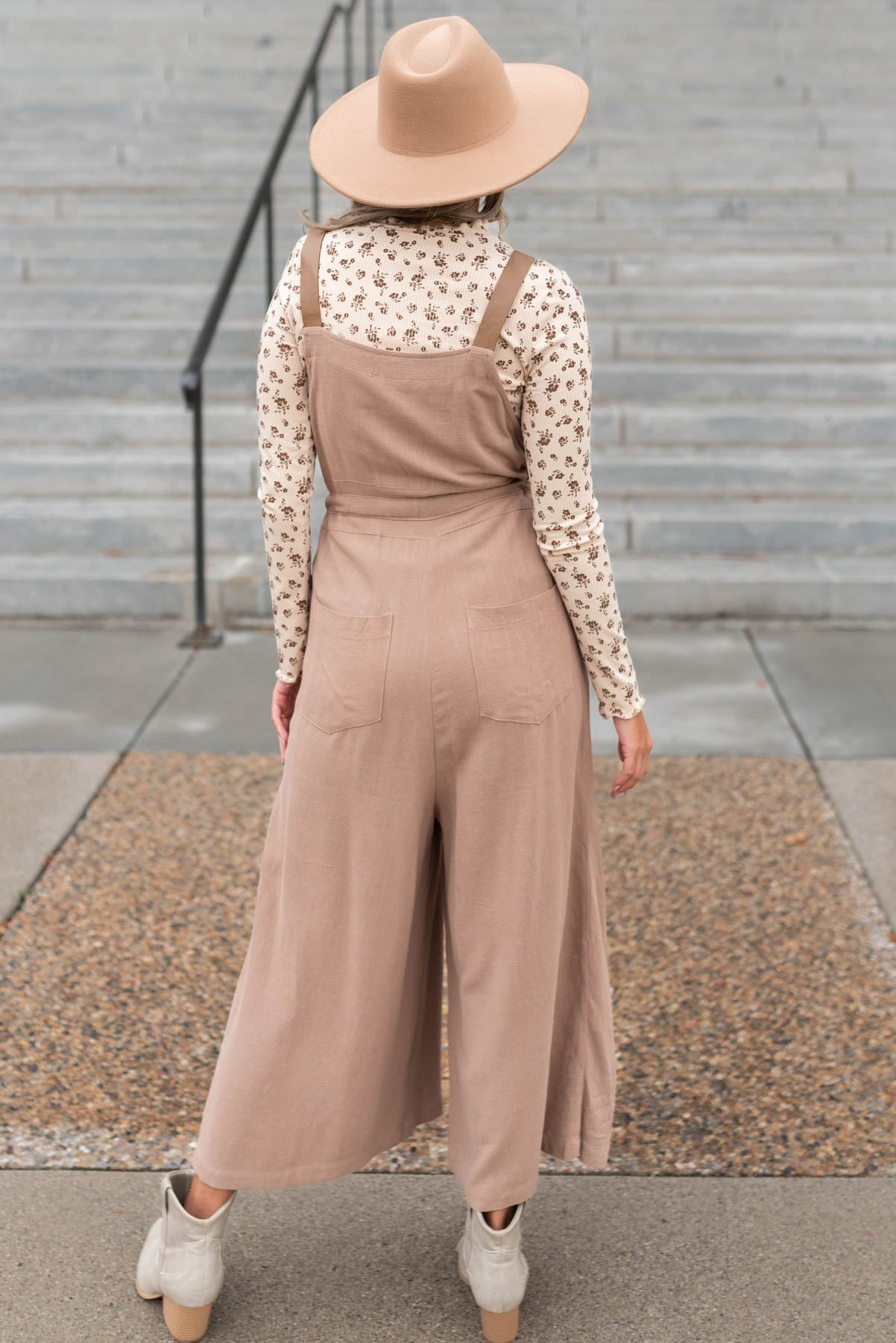 Back view of a mocha jumpsuit