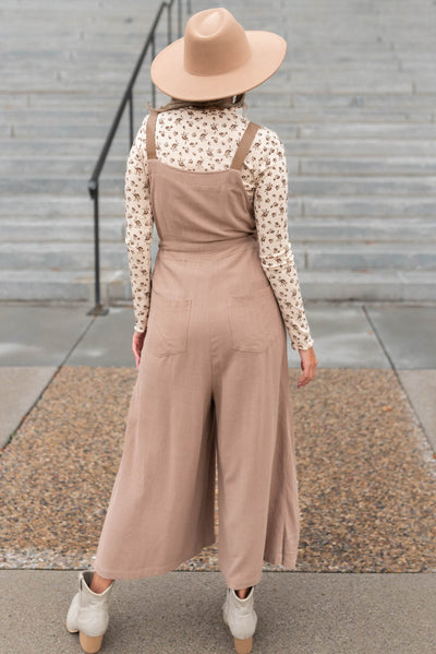 Back view of a mocha jumpsuit