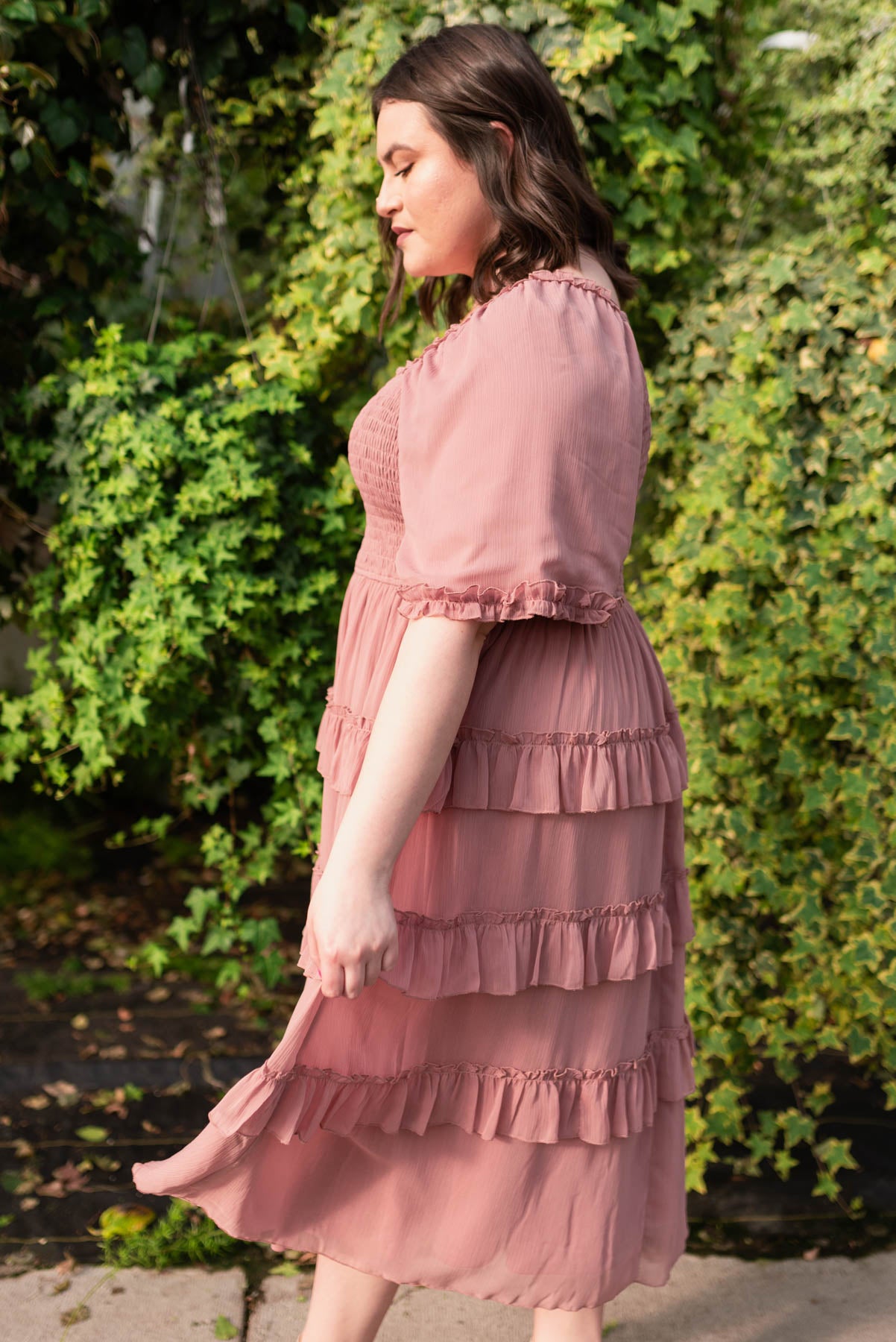 Side view of the plus size dusty pink tiered dress