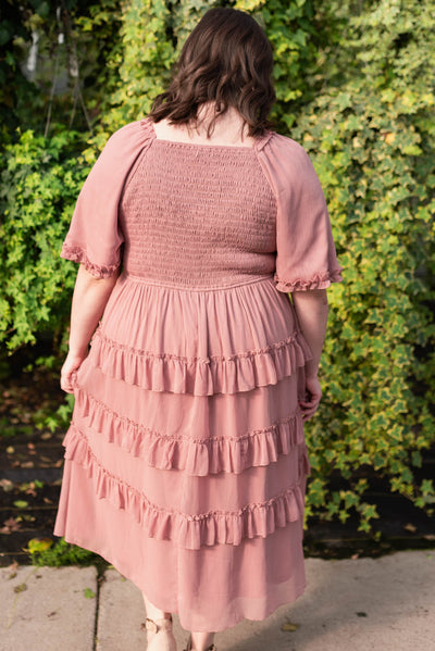 Back view of the plus size dusty pink tiered dress