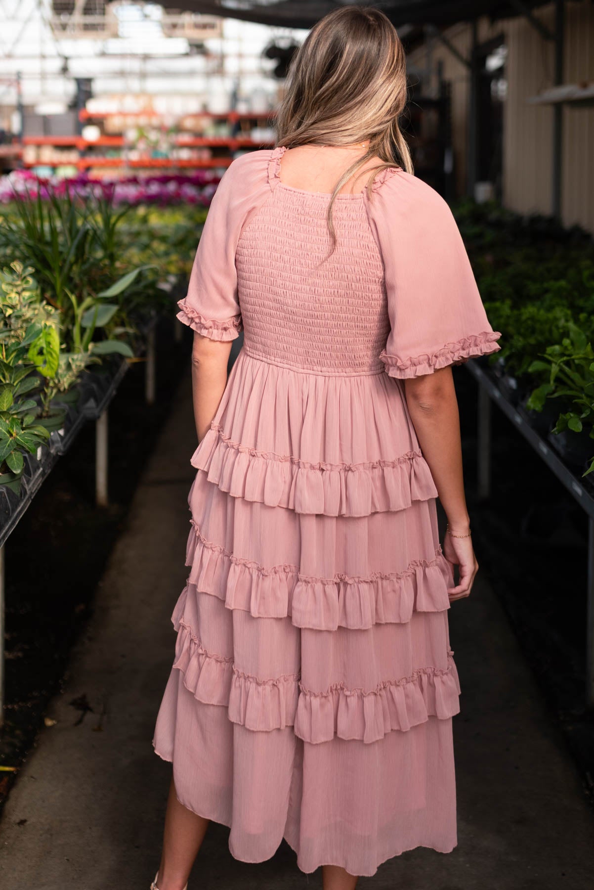 Back view of the dusty pink tiered dress