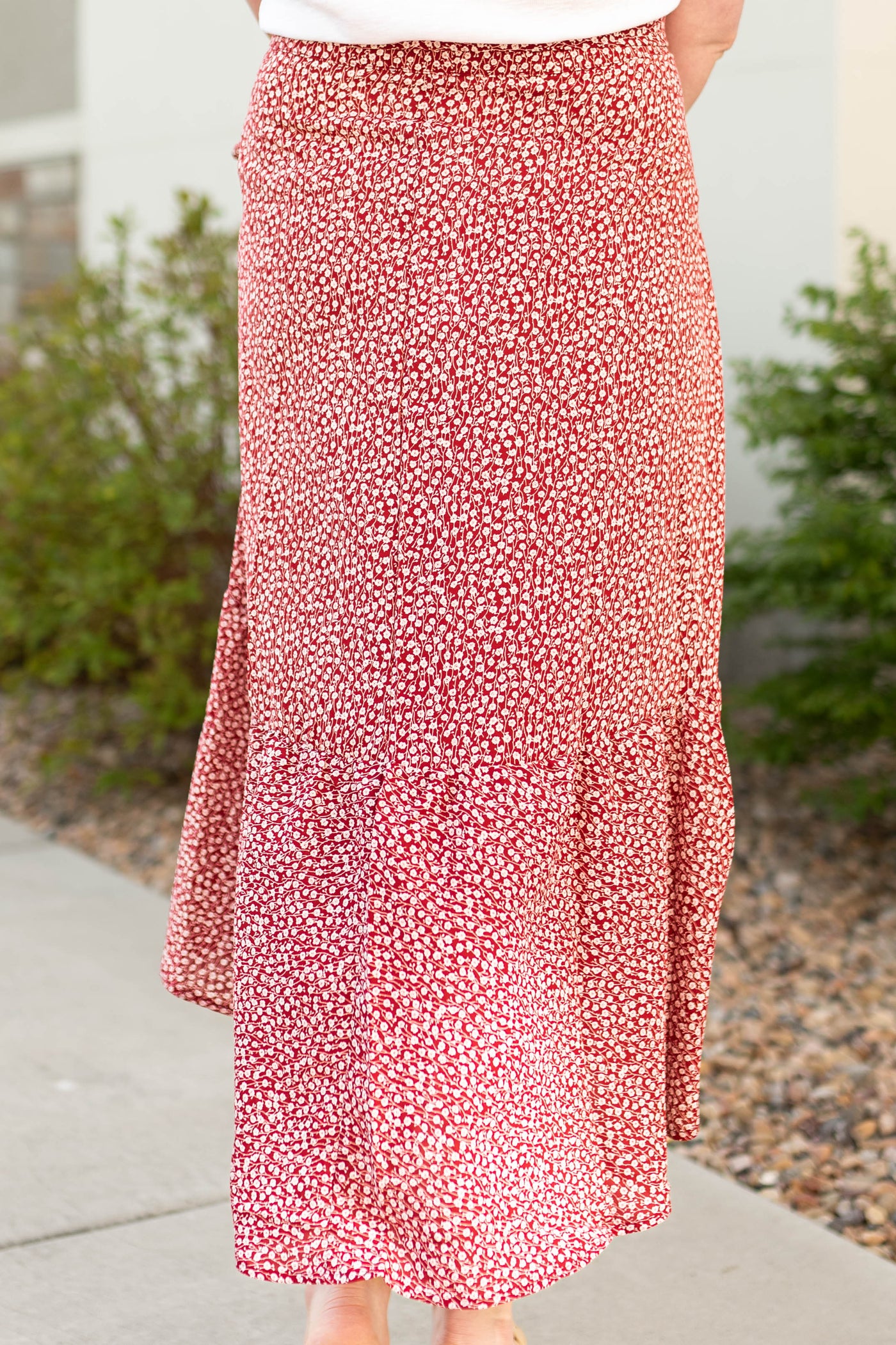 Red wrap skirt with small white flowers