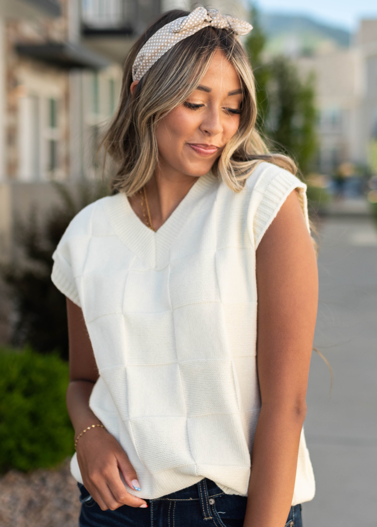 Ivory sweater vest with v-neck