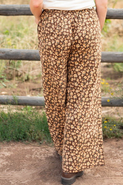 Back view of brown floral pants