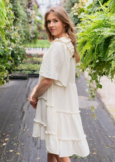 Side view of the ivory mini dress