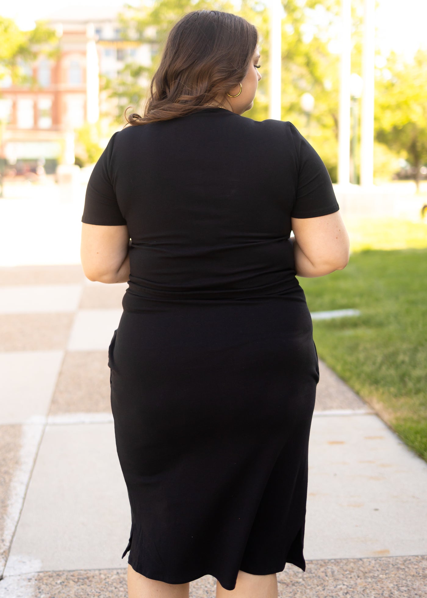 Back view of a knit black dress