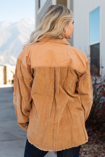 Back view of a caramel shacket