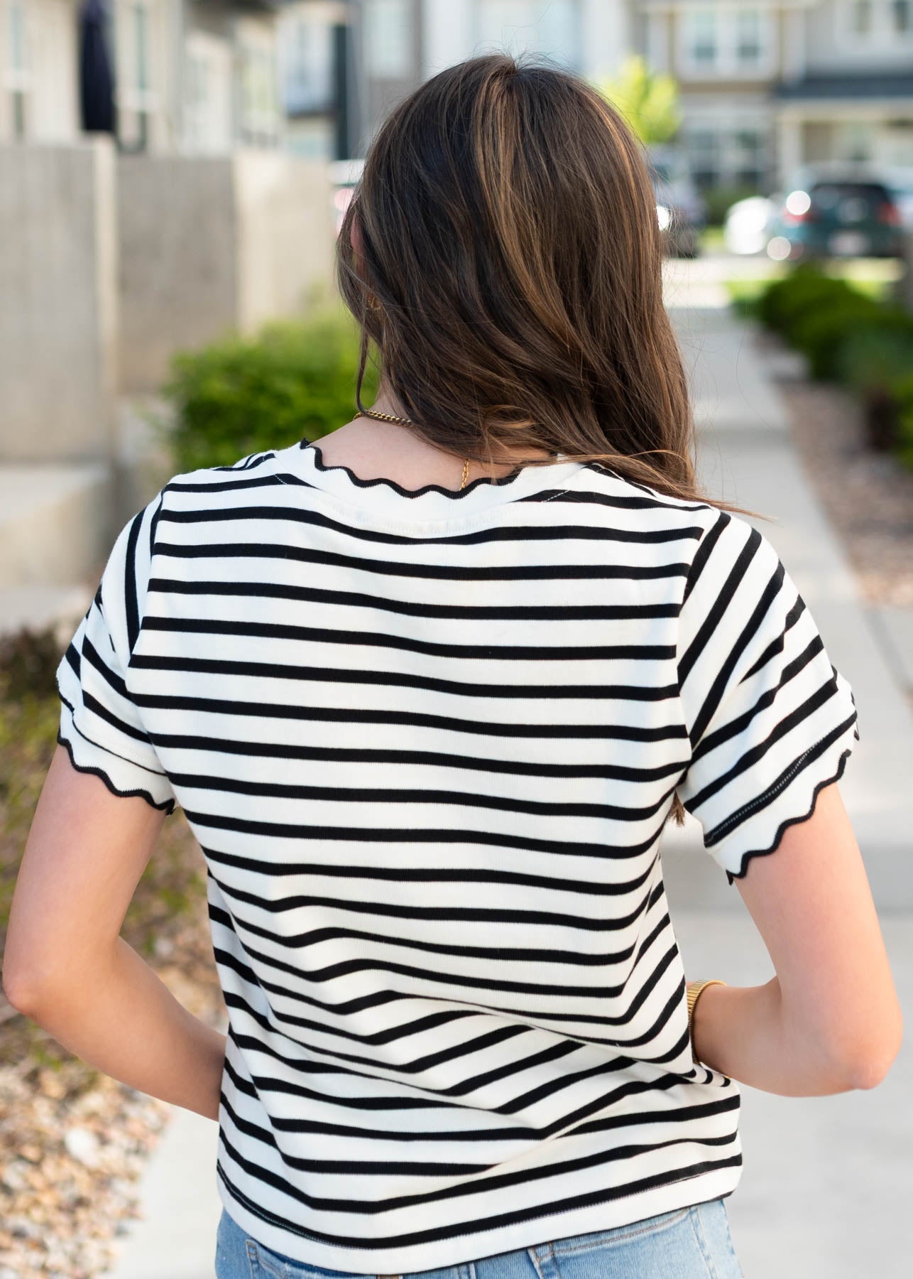 Back view of the black striped top