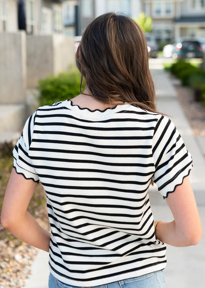 Back view of the black striped top