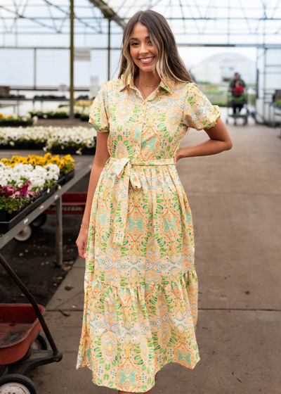 Short sleeve green floral dress with tiered skirt