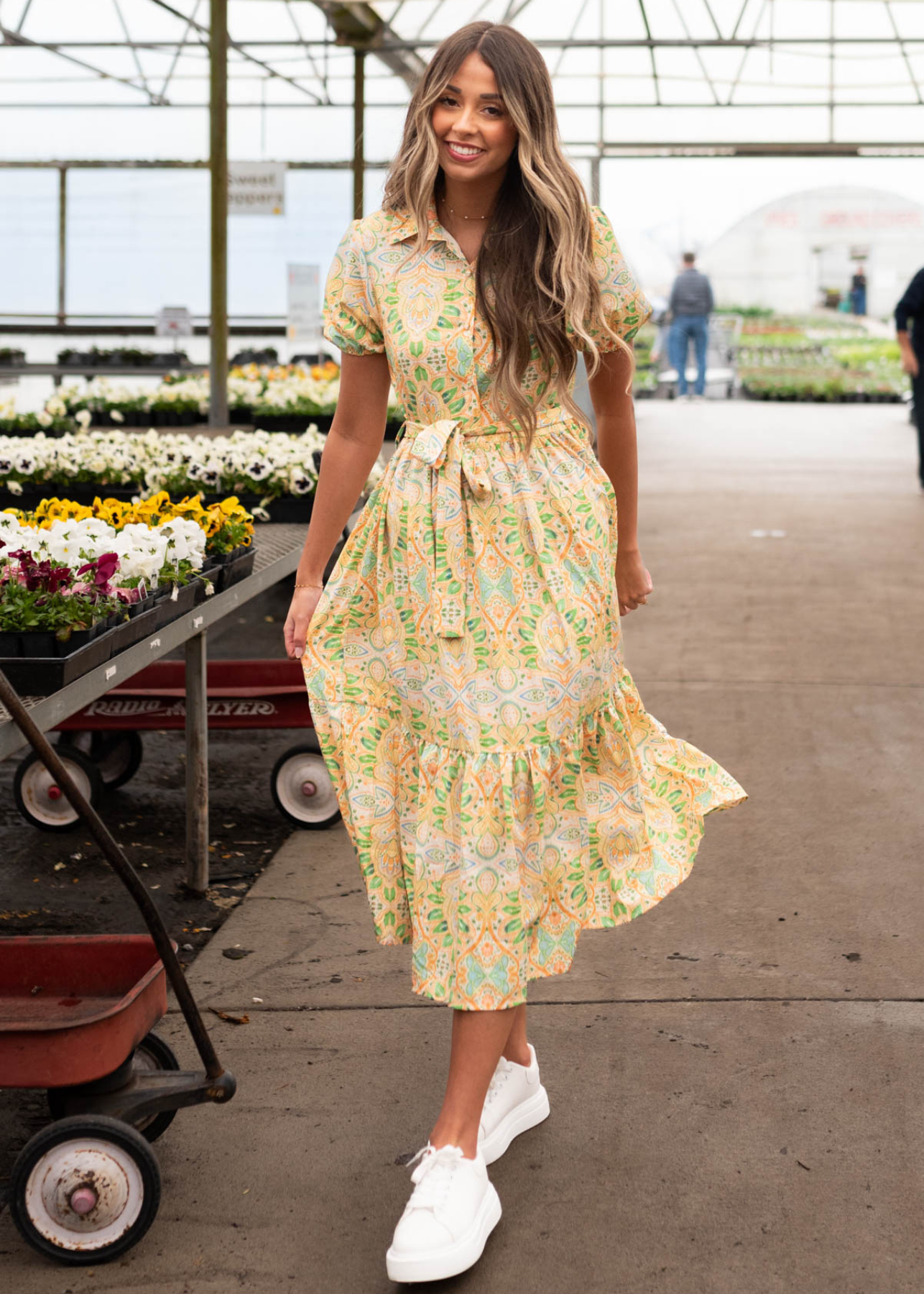 Green floral dress with a tie at the waist and collar