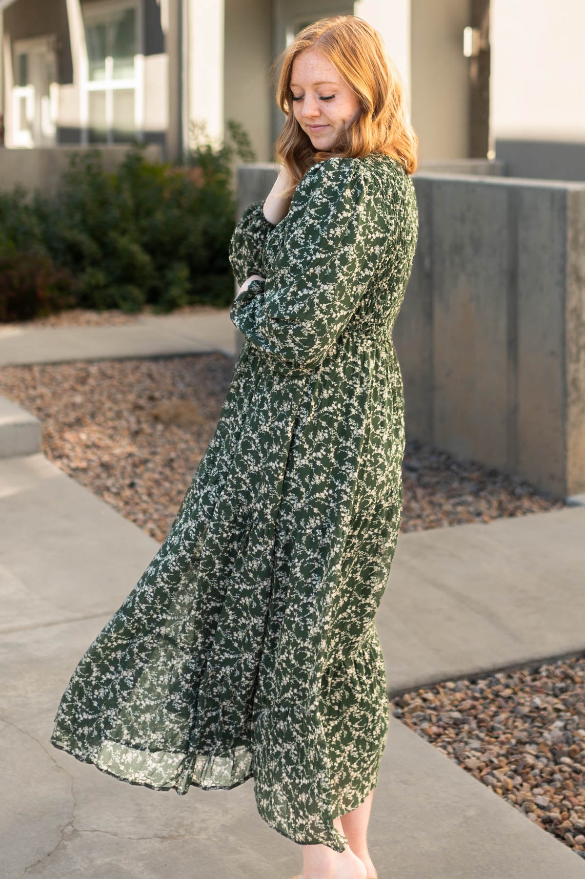 Side view of a dark green dress