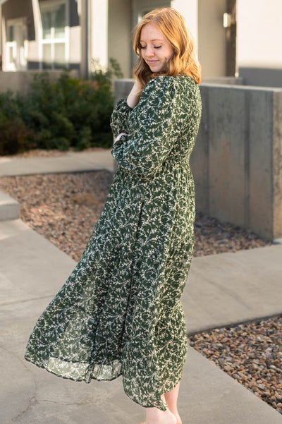 Side view of a dark green dress