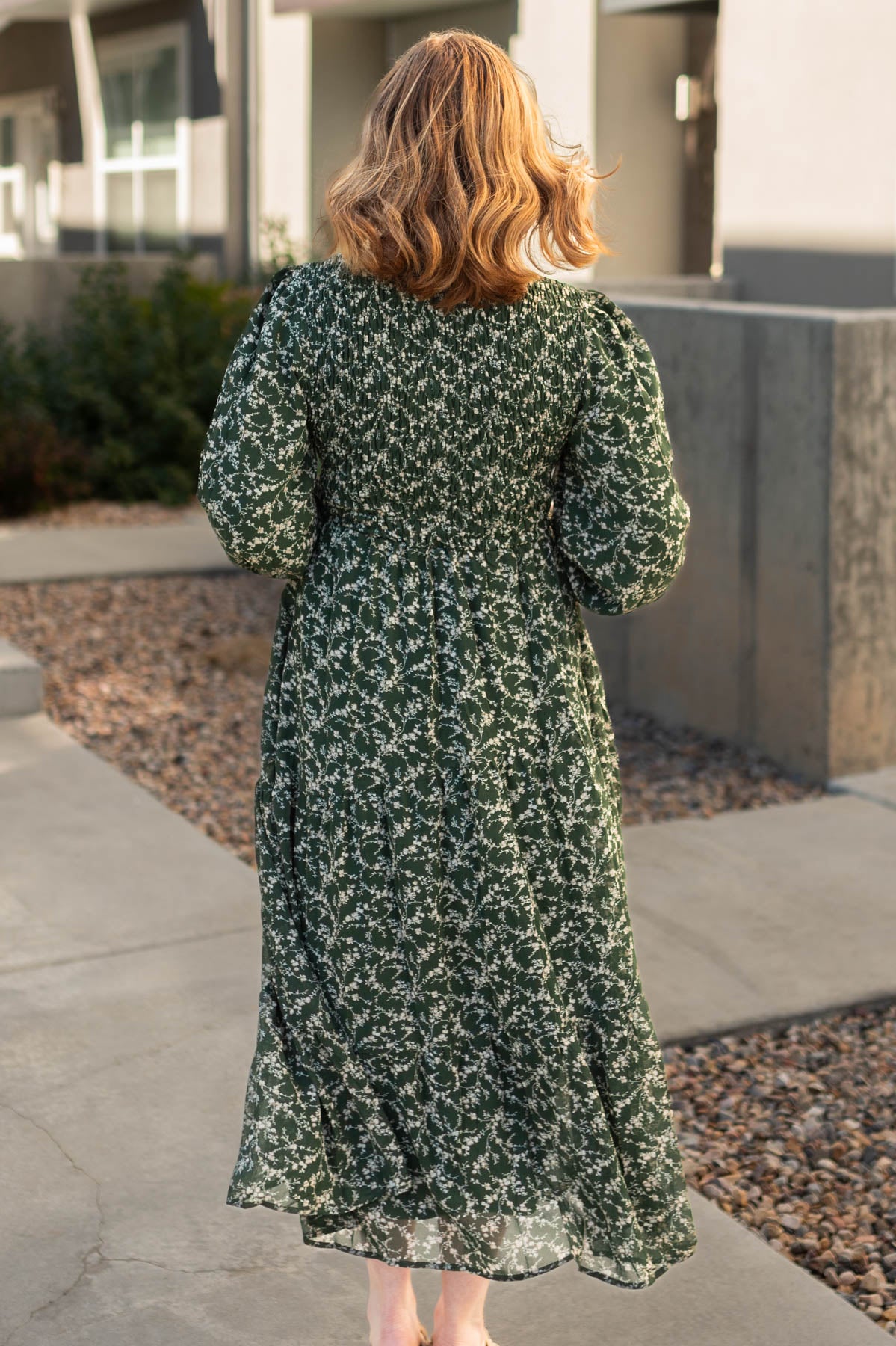 Back view of a dark green dress