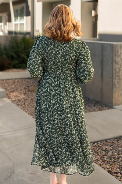 Back view of a dark green dress