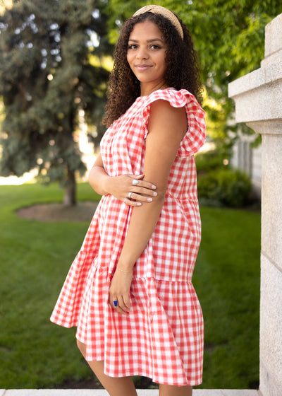 Side view of a red gingham dress