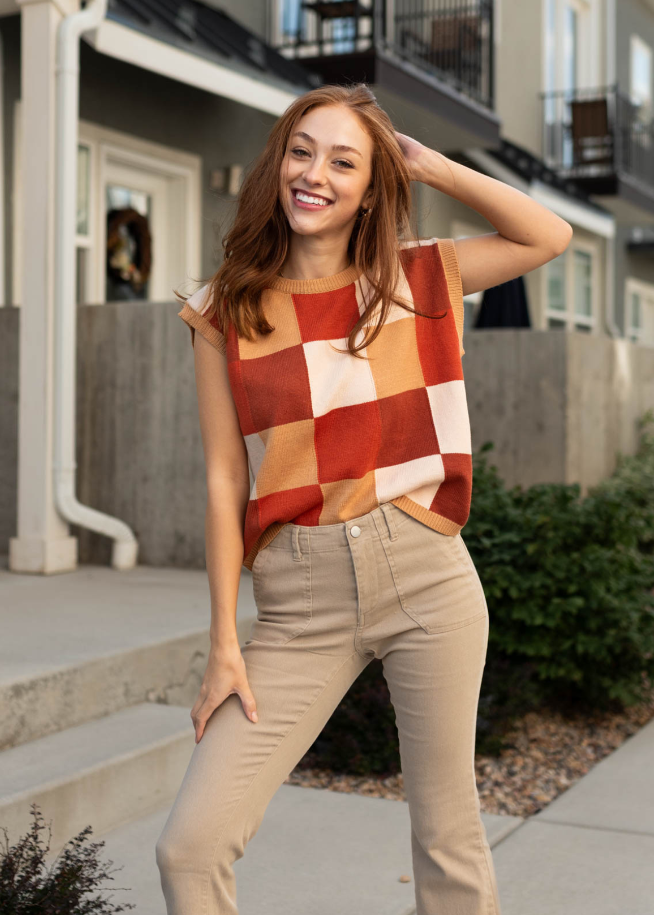 Drop sleeve checkered sweater vest