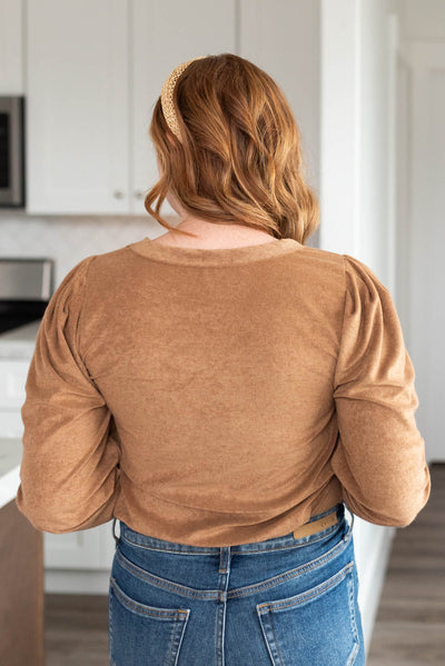 Back view of a camel puff sleeve top